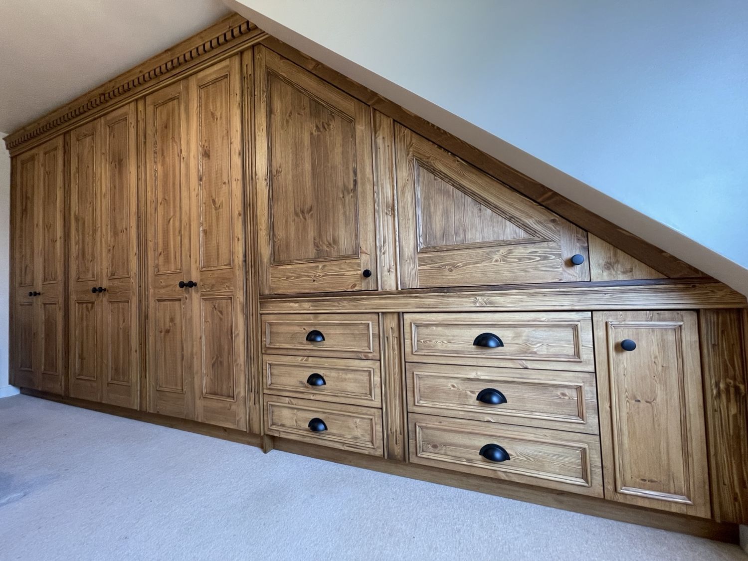 Angled Stained Pine Bedroom — Stoney Stanton